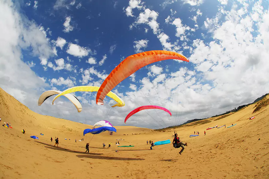 Paragliding Over the Sand Dunes